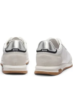 Sneakers aus verschiedenen Materialien mit strukturiertem Gewebe