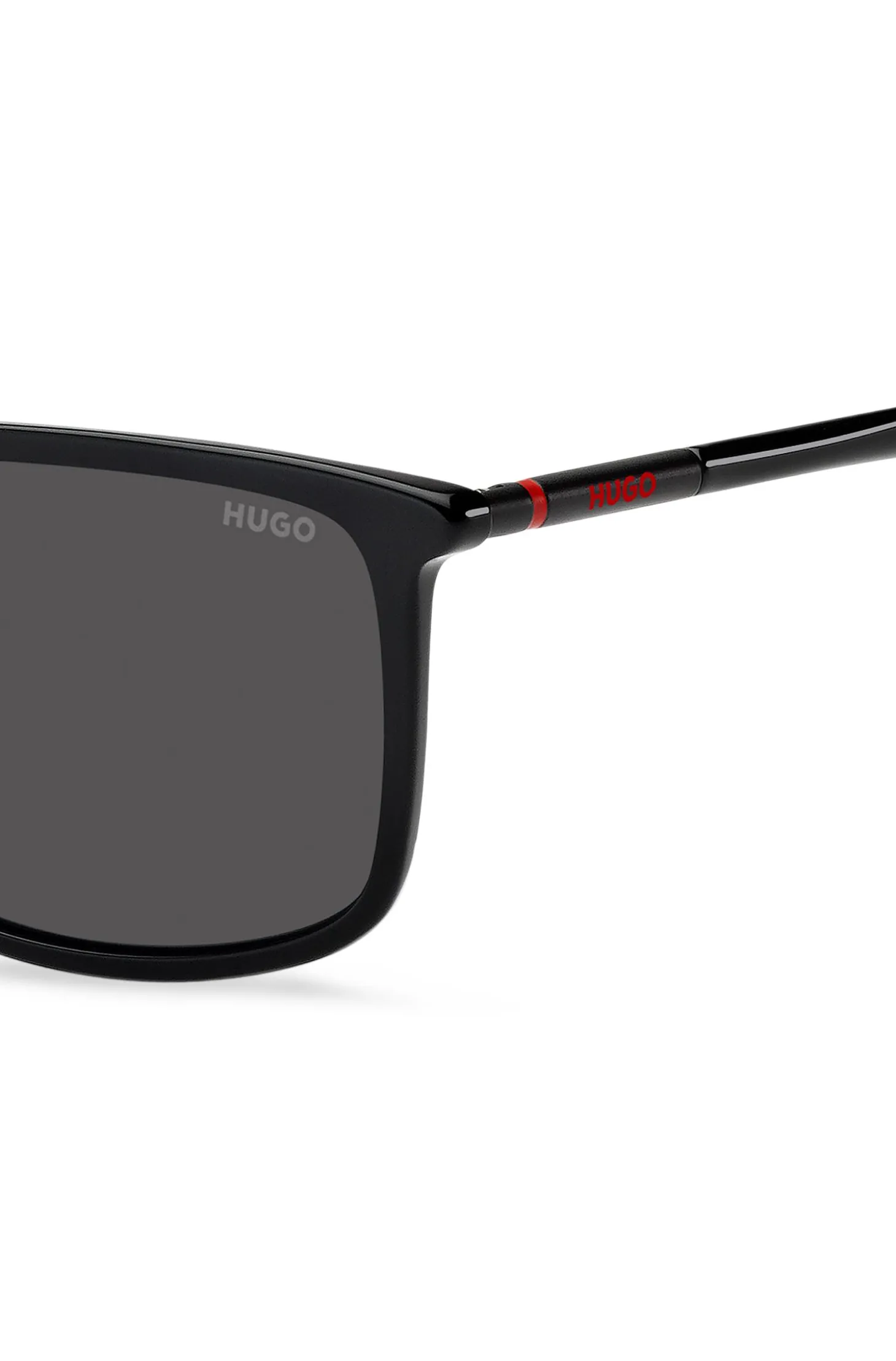 Sonnenbrille aus schwarzem Acetat mit röhrenförmigen Bügeln