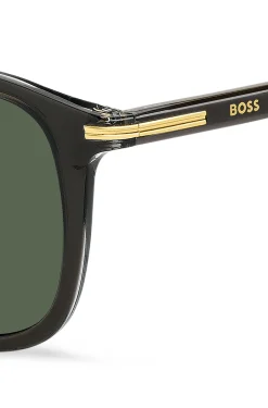 Sonnenbrille aus schwarzem Acetat mit goldfarbenen Details