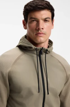 Strickjacke aus verschiedenen Materialien mit Jacquard-Grafik