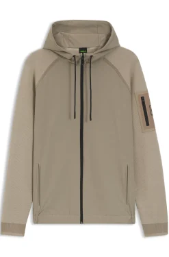 Strickjacke aus verschiedenen Materialien mit Jacquard-Grafik