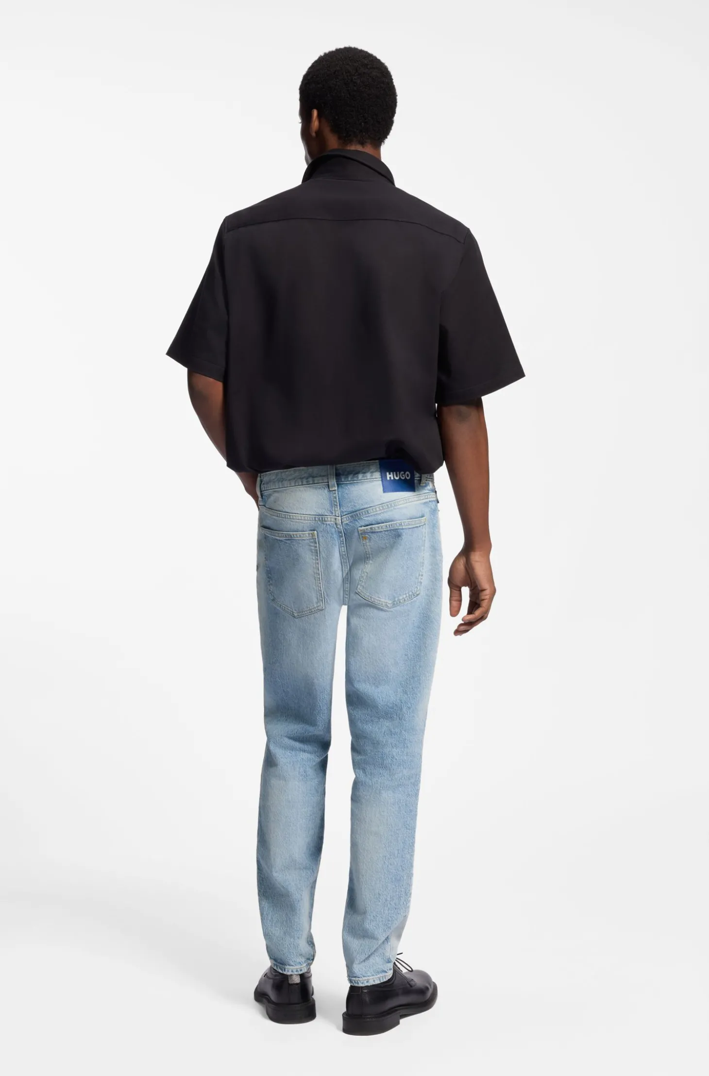 Tapered-Fit Jeans aus hellblauem Used-Denim