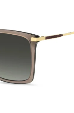 Transparent-braune Sonnenbrille mit goldfarbenen Details
