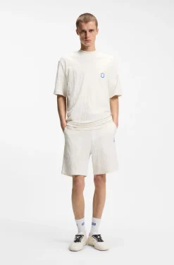 T-Shirt aus Baumwoll-Frottee mit Happy HUGO Logo