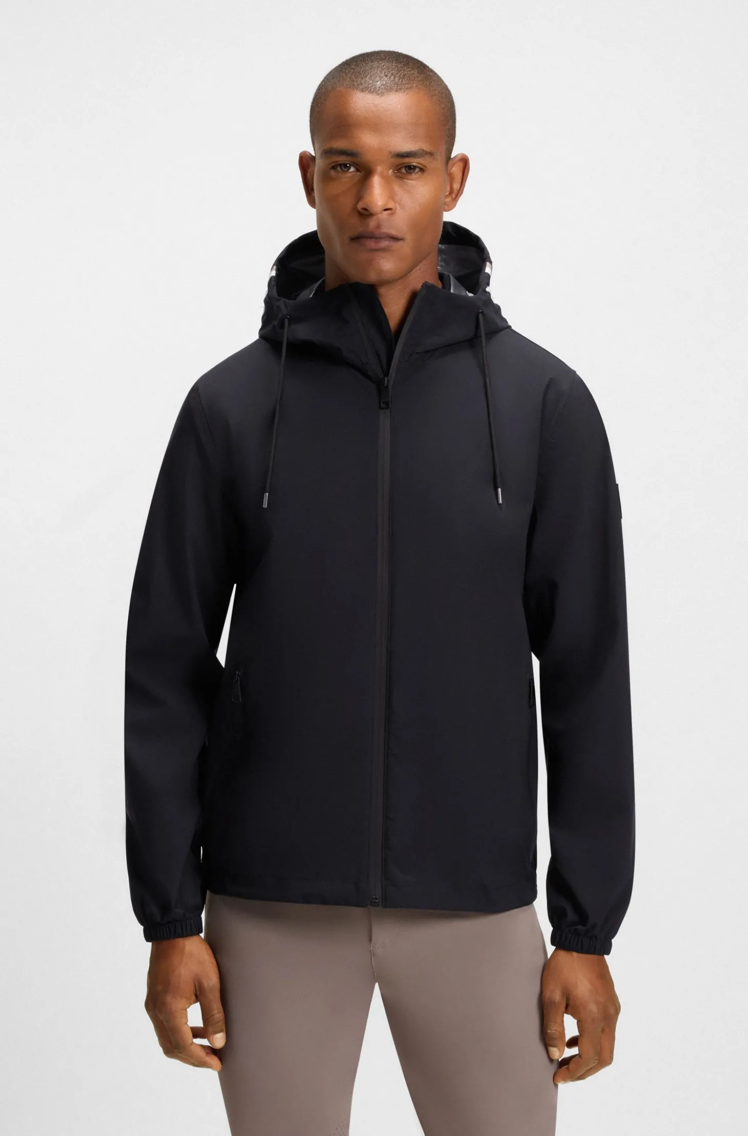 Wasserdichte Reitsport-Jacke mit verstellbarer Kapuze