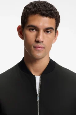Wattierte Sweatjacke aus Material-Mix mit Reißverschluss