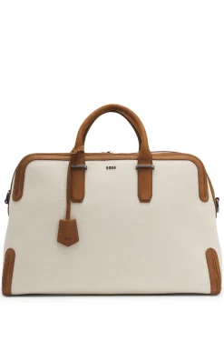 Weekender aus Canvas mit Lederbesatz